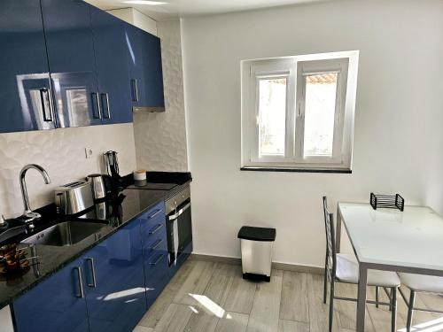 Η κουζίνα ή μικρή κουζίνα στο Casa D´Aldeia - Carrapateira
