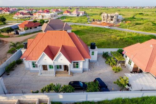 an overhead view of a house with an orange roof at Dodoma furnished Apartment in Dodoma