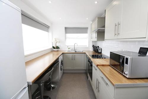 Η κουζίνα ή μικρή κουζίνα στο Modern and Cosy Flat For 4