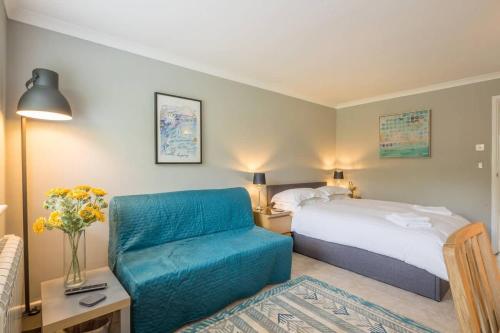 Ένα ή περισσότερα κρεβάτια σε δωμάτιο στο Addenbrookes Flat 2 mins walk free Private Parking