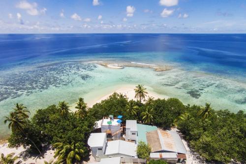 an aerial view of a resort on a beach at Liberty Guesthouse Maldives in Mahibadhoo