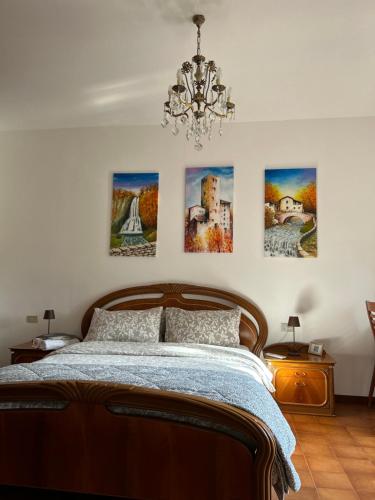 A bed or beds in a room at Villa Dei Cedri