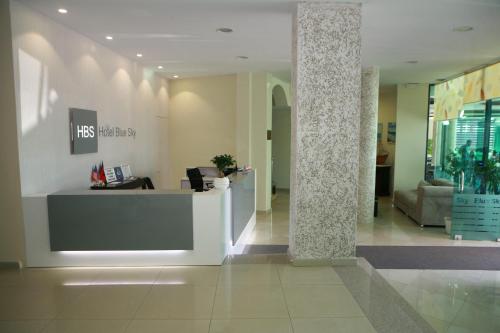 a lobby with a reception desk in a building at Hotel Blue Sky in Sarandë