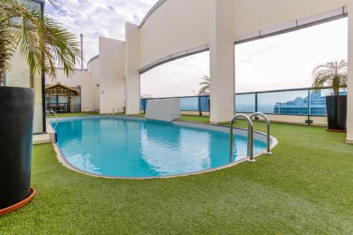a swimming pool in the middle of a building at First Central Hotel Suites in Dubai