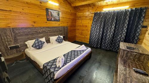 Postel nebo postele na pokoji v ubytování OZIBA BEACH RESORT