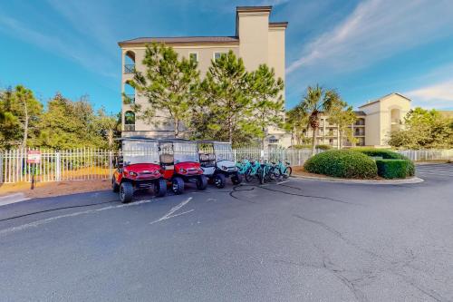 a row of motorcycles parked in front of a building at Amalfi Coast in Miramar Beach