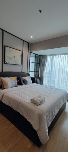 Cama o camas de una habitación en BRANZ BSD Prime Location - BSD Central Business District & ICE BSD