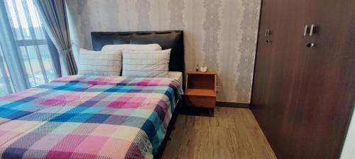 Cama o camas de una habitación en BRANZ BSD Prime Location - BSD Central Business District & ICE BSD