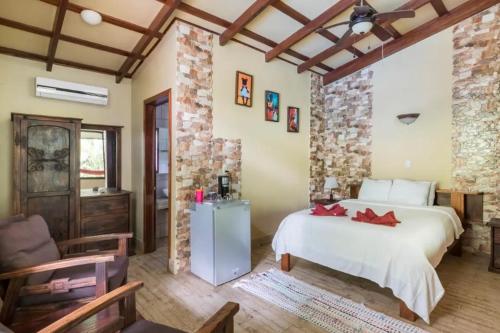 Postel nebo postele na pokoji v ubytování Casa Caribbean Coconut