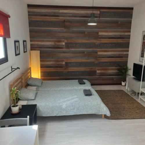 Ένα ή περισσότερα κρεβάτια σε δωμάτιο στο Sunset house