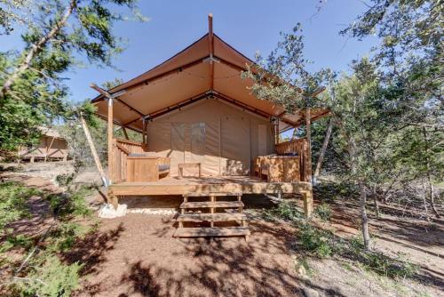 a rendering of a house in the woods at 12 Fires Luxury Glamping #5 in Johnson City