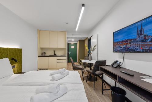 Katil atau katil-katil dalam bilik di Studio Apartments Lenuzzi Zagreb