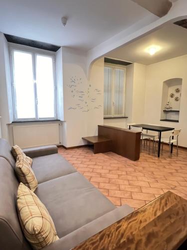 a living room with a couch and a table at CASA ALBY in Rapallo