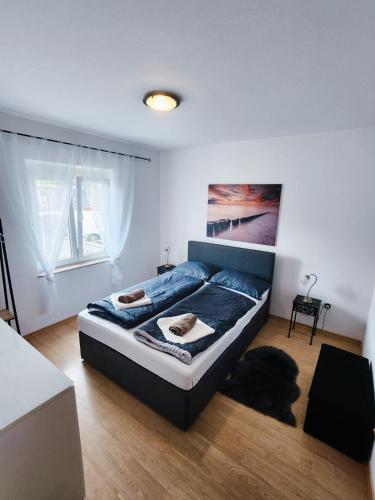 a bedroom with a large bed in a room at Apartment Vanessa in Krk
