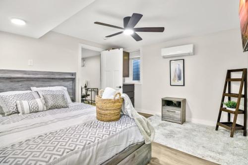 a bedroom with a bed and a ceiling fan at BRAND NEW Private and Modern 2BR Unit in Minneapolis