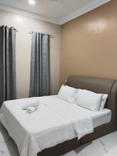 Кровать или кровати в номере Villa Adeeva Homestay Langkawi