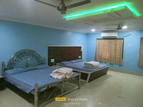 Lova arba lovos apgyvendinimo įstaigoje Similipal Khairi Resort