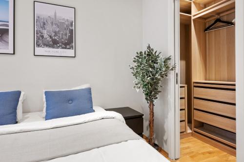 Katil atau katil-katil dalam bilik di Luxury 12-Guest Apartment