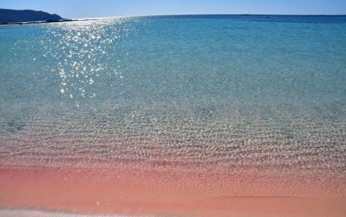 a view of the beach with the sand and water at White Lake Holiday House in Elafonisi