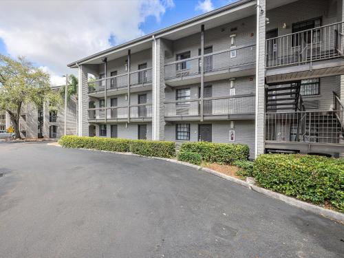 an empty parking lot in front of a building at La Quinta Inn by Wyndham Miami Airport North in Miami