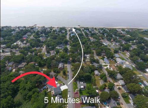 an aerial view of a street with a red arrow at Beach House Cape May just 1 block from the Bay & a Short 5 minutes walk, Sleeps 19 in Cape May