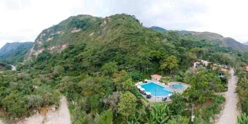 an aerial view of a mountain with a swimming pool at Donce Extremo in San Carlos