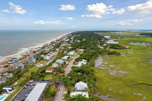 an aerial view of a beach and the ocean at Champagne and Sunsets in Edisto Island