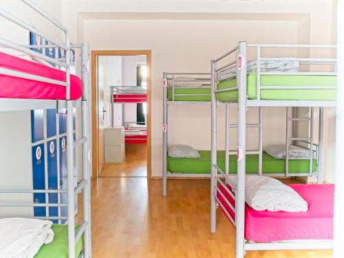 a room with a bunch of bunk beds at Urban Elephants Hostel in Bratislava