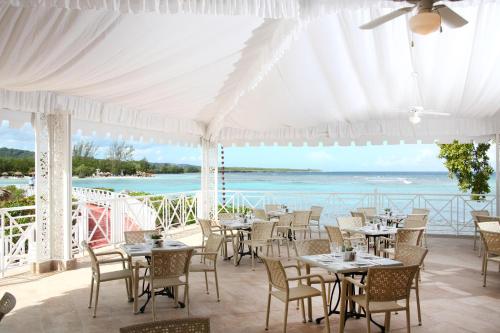 a restaurant with a view of the ocean at Bahia Principe Grand Jamaica - All Inclusive in Runaway Bay