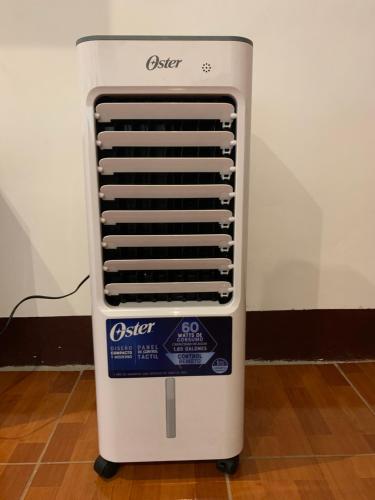 a chest heater is sitting on a floor at Apartamento Tulül in San Martín Zapotitlán