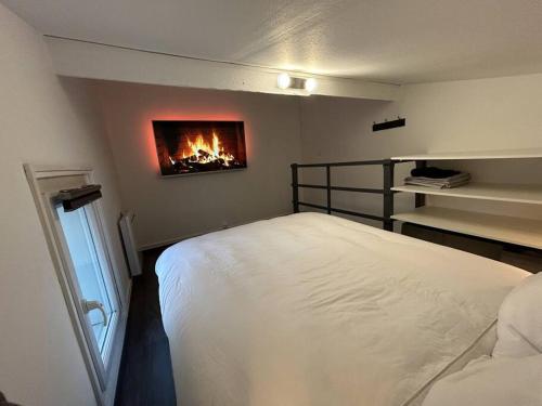 Katil atau katil-katil dalam bilik di Le Paddock - COSY FLAT Senlis