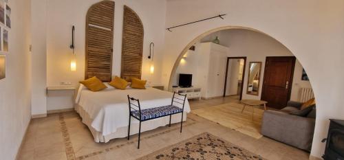 Postel nebo postele na pokoji v ubytování PETIT HOTEL ALGAIDA