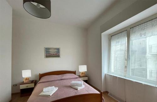 Postel nebo postele na pokoji v ubytování Mare Fuori BedAndBreakfast