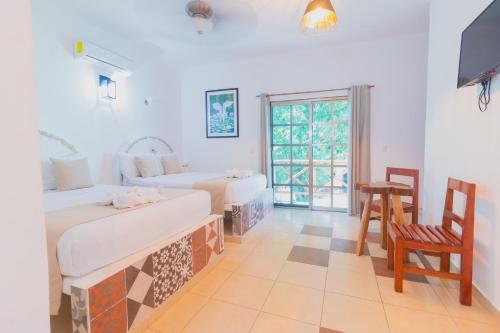 Postel nebo postele na pokoji v ubytování Hotel Szapot