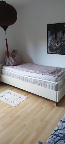 a mattress sitting on a floor in a room at Zimmervermietung Bern in Bern