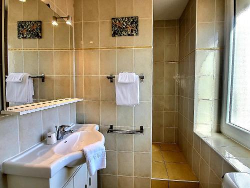 Koupelna v ubytování Atlantis Hôtel