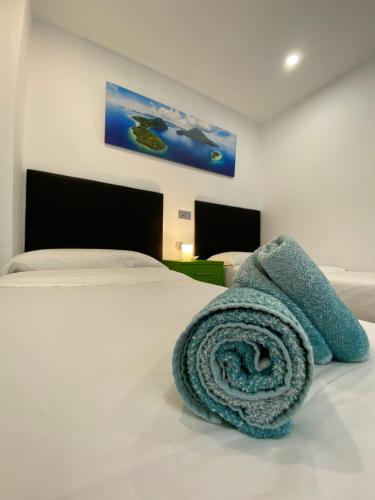 Ένα ή περισσότερα κρεβάτια σε δωμάτιο στο Beach apartment Palma Center