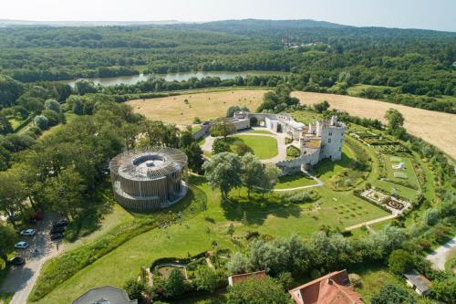 an aerial view of a castle and a park at Appart - Rés du Parc- Hardelot in Hardelot-Plage