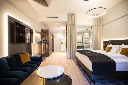 Posteľ alebo postele v izbe v ubytovaní Hotel Böhlerstern
