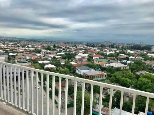 a view of a city from a balcony at Best choice in Kutaisi