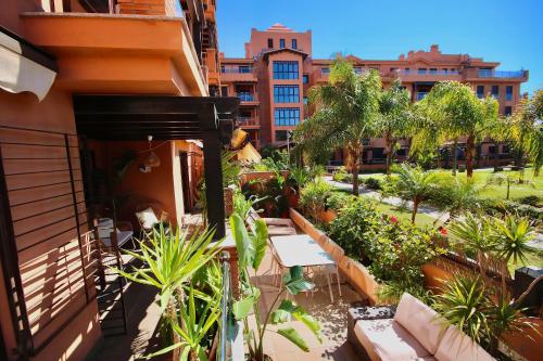 Κήπος έξω από το Dos Mares Apartamentos Playa Granada