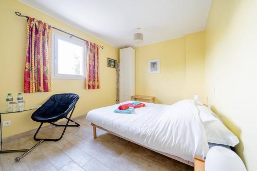 Postel nebo postele na pokoji v ubytování Maison Besun