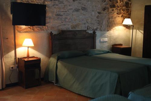 Lova arba lovos apgyvendinimo įstaigoje Can Casadellà