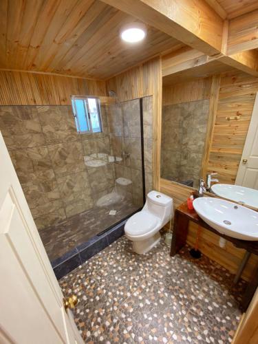 Ein Badezimmer in der Unterkunft Lilafken Apart Pichilemu