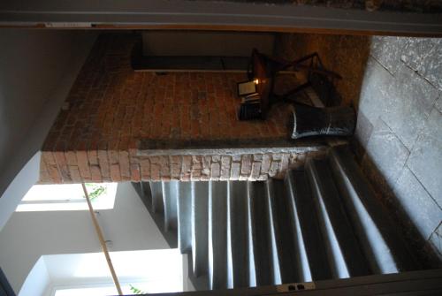 an overhead view of a spiral staircase in a building at Rex Petit in Stockholm
