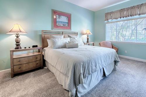 a bedroom with a bed and a window at Tivoli 5258 in Destin