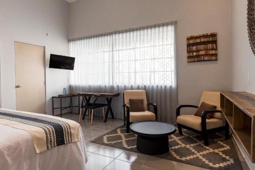 Cama o camas de una habitación en Casa Murmullos