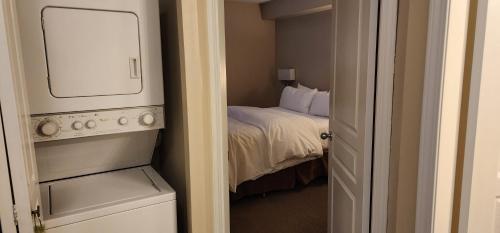 Postel nebo postele na pokoji v ubytování Times Square Suites Hotel