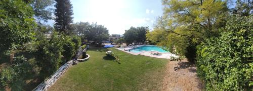 Vista de la piscina de Hotel El Trebol o alrededores
