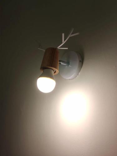 a pair of lights hanging from a ceiling at STAR HOTEL in Tawau